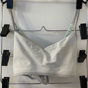 Two Lululemon sports bras.